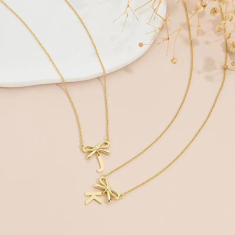KYROVIA Gold Bow Initial Necklaces – product photo 6 of 9