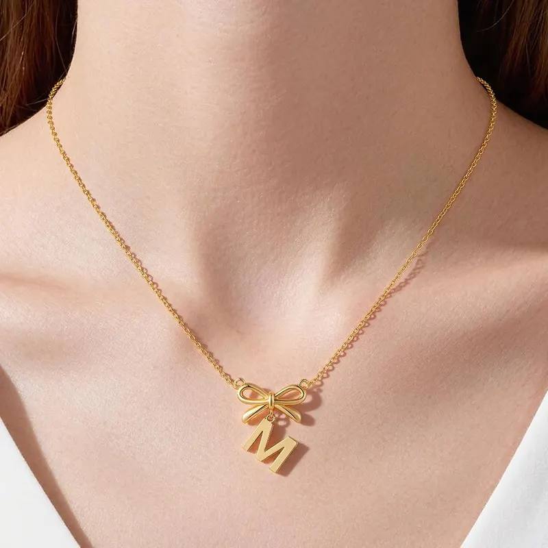 KYROVIA Gold Bow Initial Necklaces – product photo 8 of 9